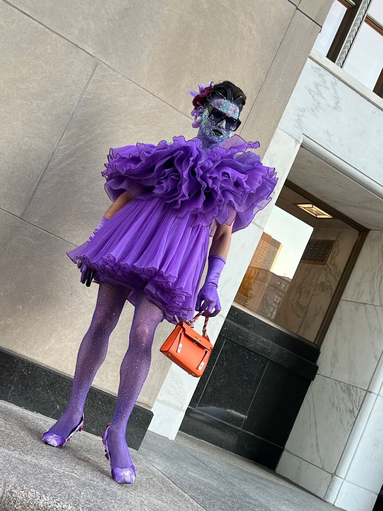 Guest dressed to impress. (Photo by Candid Candace Jordan)