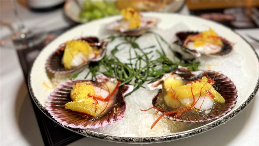 Peruvian scallops on the half shell.