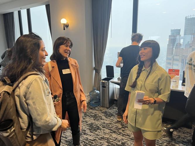 CreativeMornings Chicago Host Marlene Mingles with Guests
