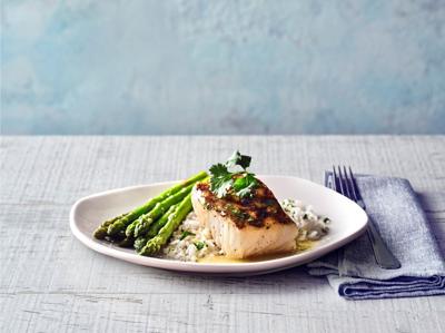 Parker’s Margarita Sea Bass is wood-grilled with chef-crafted tequila lime sauce, with jasmine rice and asparagus