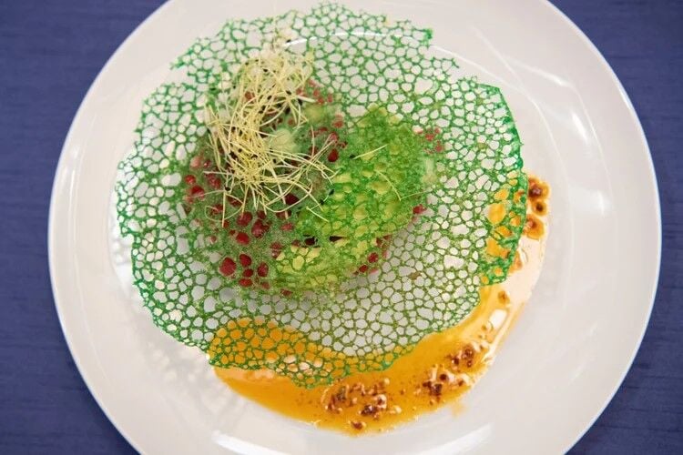 Chef Andres Farias of Terrace 16 prepared Tuna Poke. (Meals on Wheels photo)