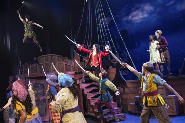 (From L) Nolan Almeida as Peter Pan, Cody Garcia as Captain Hook, Hawa Kamara as Wendy and the cast of Peter Pan. (Photo | Matthew Murphy)