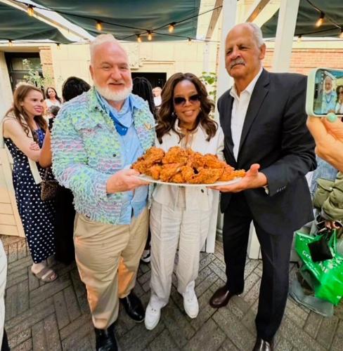 Chef Art Smith with Oprah, Stedman and his famous fried chicken and a Harpo Reunion at his restaurant. (Photo | @thechefartsmith Insta)