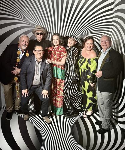 Arts lover Ken Norgan (R) and Jose Conforme (2nd from L) and friends enjoy The Joffrey Ballet's Sir Real Gala at the Old Post Office. (Sean Su photo)