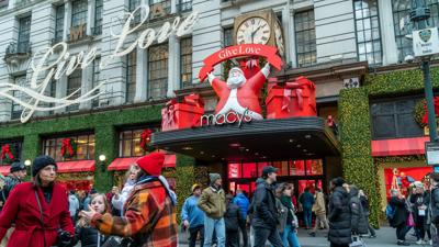 Holiday shoppers swarm Macy's Herald Square, New York