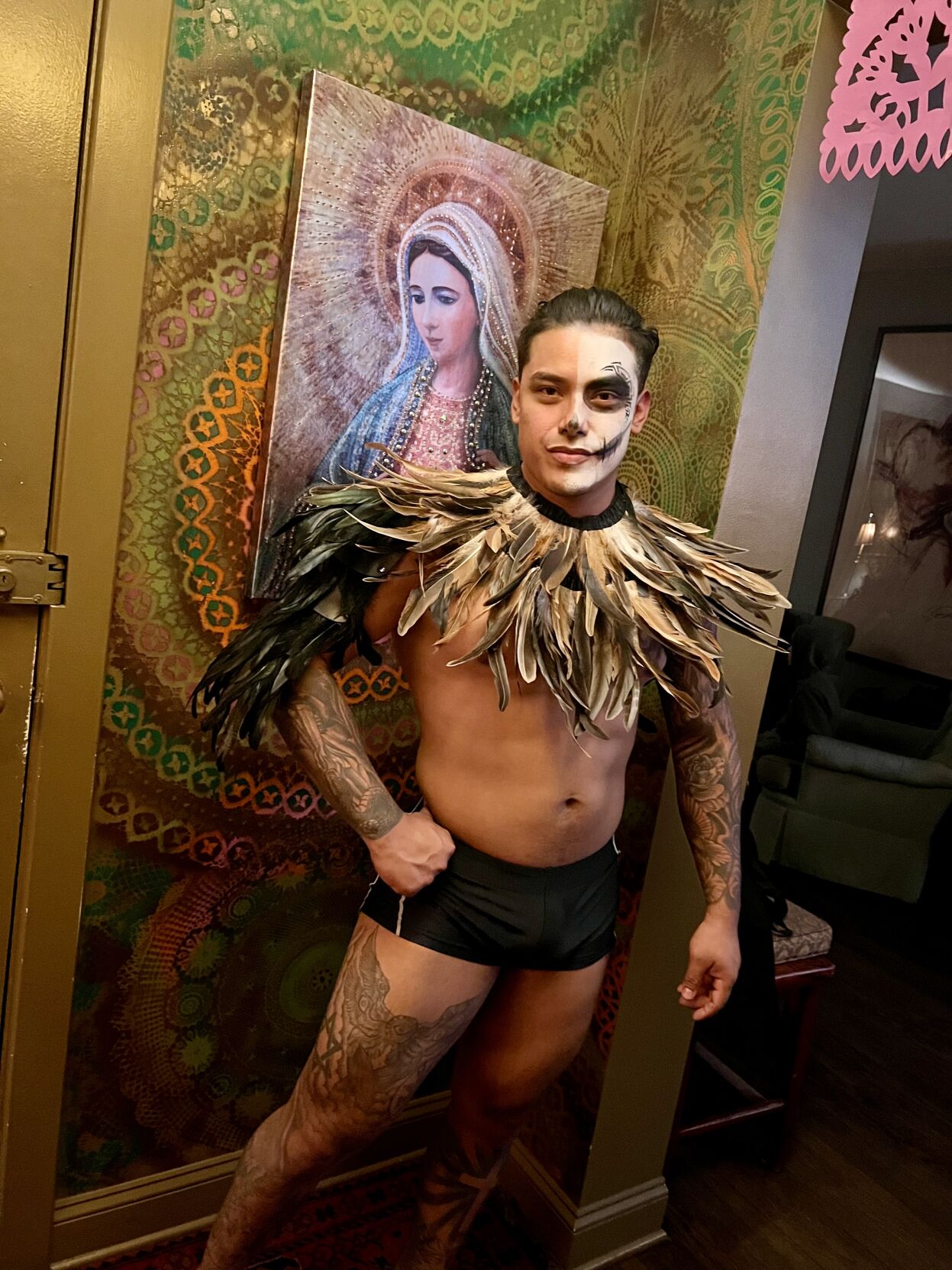 A greeter at the Dia de los Muertos party. (Photo by Candace Jordan)