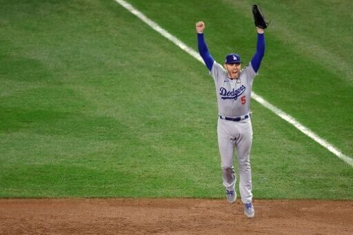 Los Angeles Dodgers first baseman Freddie Freeman celebrates his team's World Series win