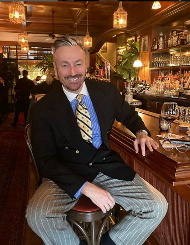 The always dapper Mark Olley relaxing at Le Colonial in Chicago.