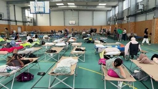 Thousands of evacuated people are being put up in emergency shelters