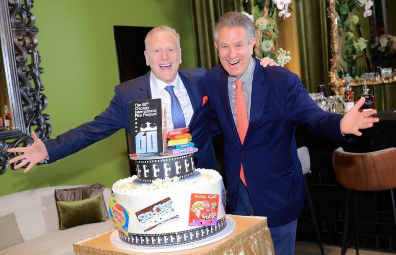 CIFF board member Jon Harris and March Schulman pose beside the Cinema Soiree Eli's Cheesecake. (Photo Sean Su/ Purple Photo Group)