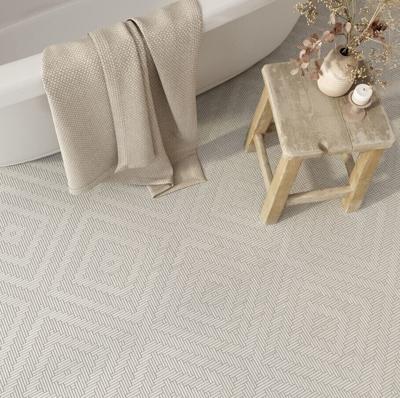 SIENA BEIGE IS A HAND-CUT MARBLE MOSAIC BY SPECIALLY TRAINED ARTISAN, WHICH BELONGS TO THE BOUTIQUE MOSAIC COLLECTION BY DULCET TILE. SHOWN IN AGARWOOD LIMESTONE WITH A TUMBLED FINISH.
