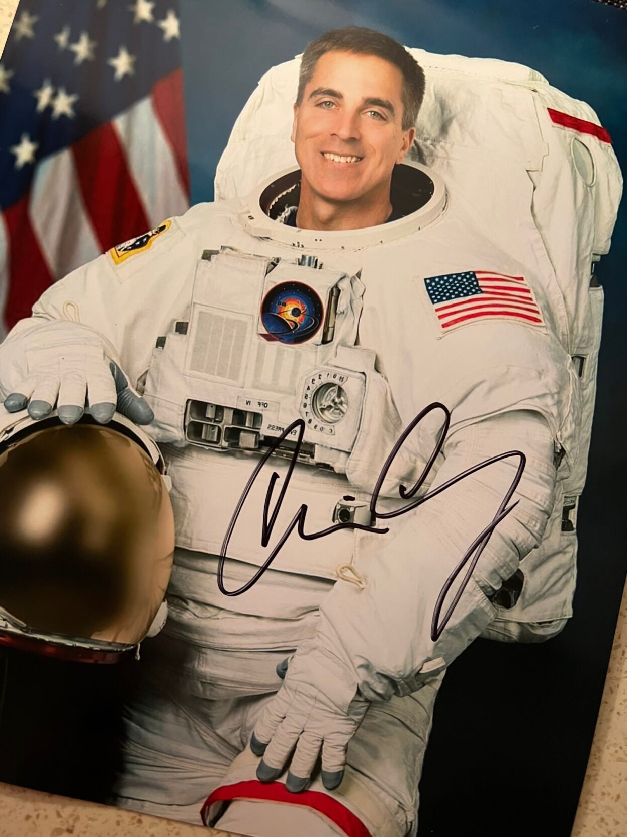 Navy SEAL and NASA astronaut, Captain Chris Cassidy. (Autographed photo courtesy of Navy Seal Foundation)