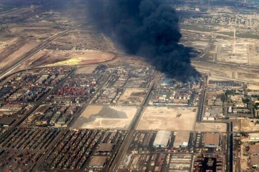 Smoke billows after the blast at Iran's Shahid Rajaee Port, in an aerial photo provided by the Iranian presidency on April 27, 2025