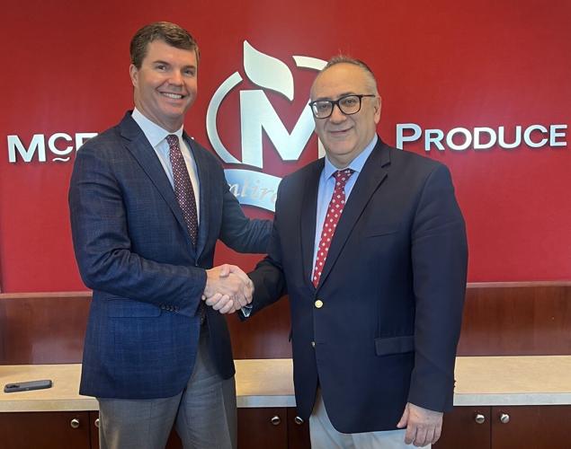 John P. Olivo, President, Fresh Express, and Carter McEntire, newly appointed Vice President of Foodservice, shake hands following the successful December 13, 2024 acquisition of McEntire Produce by Fresh Express.