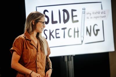 GhostRanch Executive Creative Director, Allie Ro Wilson, delivers a lightning talk at the agency's Story Camp retreat in 2024.