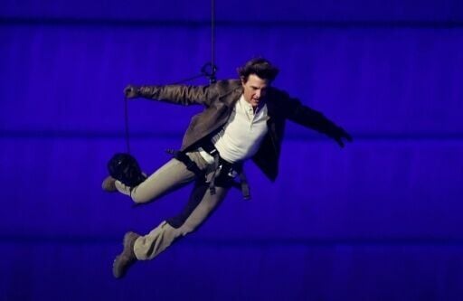 Tom Cruise jumps from the roof of the Stade de France during the closing ceremony of the Paris 2024 Olympic Games -- will he do a similar stunt at the World Cup?