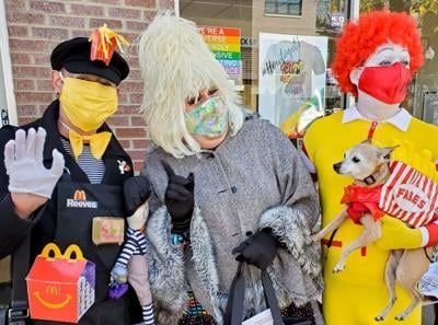 Miss Lucy Foozie, center,  will host the Lakeview Halloween Pup Crawl on Saturday, October 23.