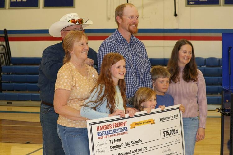 Ty with Family and Check.JPG
