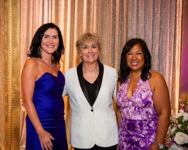 WINGS' President/CEO Rebecca Darr, boxing legend Christy Martin and Ellaine Sambo-Reyther. (Photo by Gosia Matuszewska/Rishi Productions, courtesy WINGS)