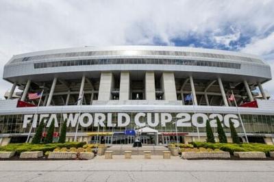 A freshly installed FIFA World Cup 2026 sign hangs over the entrance at Kansas City Stadium