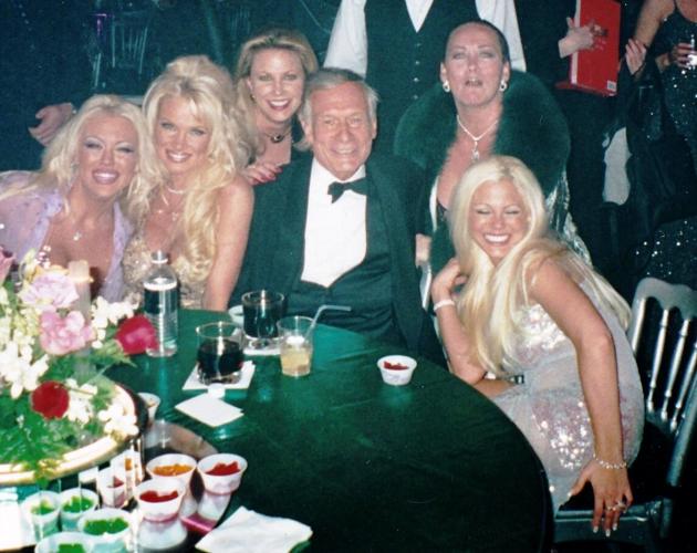 Hef surrounded by friends at a Midsummer Night's Eve party. (Another blurry pic, sorry)