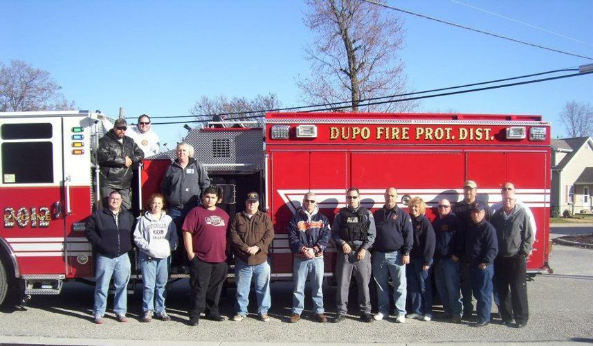 The Dupo fire truck figures prominantly in the Memorial Day Parade festivities.