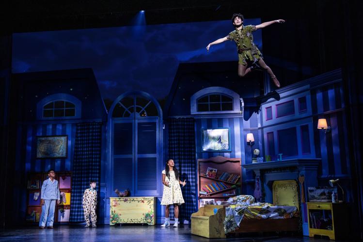 “I’m Flying.” (from L) Micah Turner Lee as John, Reed Epley as Michael, Hawa Kamara as Wendy, Nolan Almeida as Peter Pan. (Photo | Matthew Murphy)