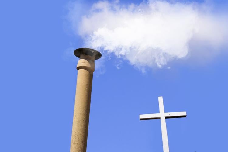 White smoke from the chimney on top of the Sistine Chapel (Vatican City) indicates that a new Pope has been elected. (Shutterstock photo)