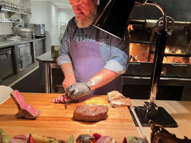 Chef Evan Funke serves up his famous bistecca Fiorentina. (Photo | Candace Jordan)