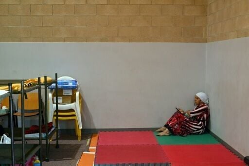 Thousands of people evacuated from fire zones have been put up in emergency shelters