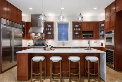 Own a piece of culinary history. Charlie Trotter's house for sale with kitchen intact. (Photo | @properties Christie’s International Real Estate)