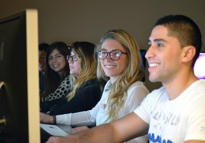 St. Thomas University students study at the university's Miami Gardens, Florida campus. STU is excited to announce a strategic partnership with the Venture Mentoring Team to enhance entrepreneurial education and provide comprehensive mentoring support t...