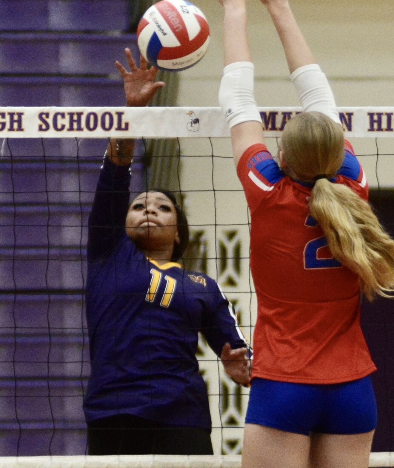 Oak Hill volleyball stars Morgan Cates and Brianna Dailey preparing for Volleyball Dominance at the net