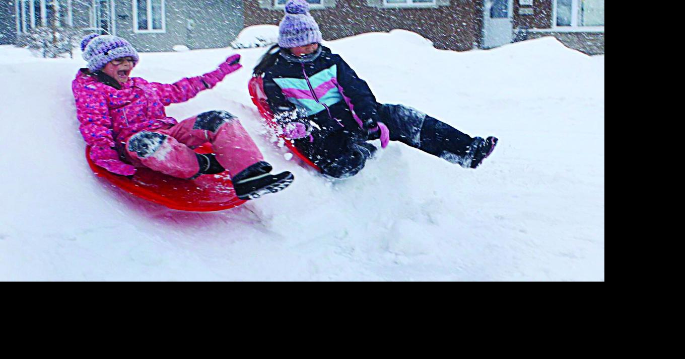 Snow hinders schools, roads