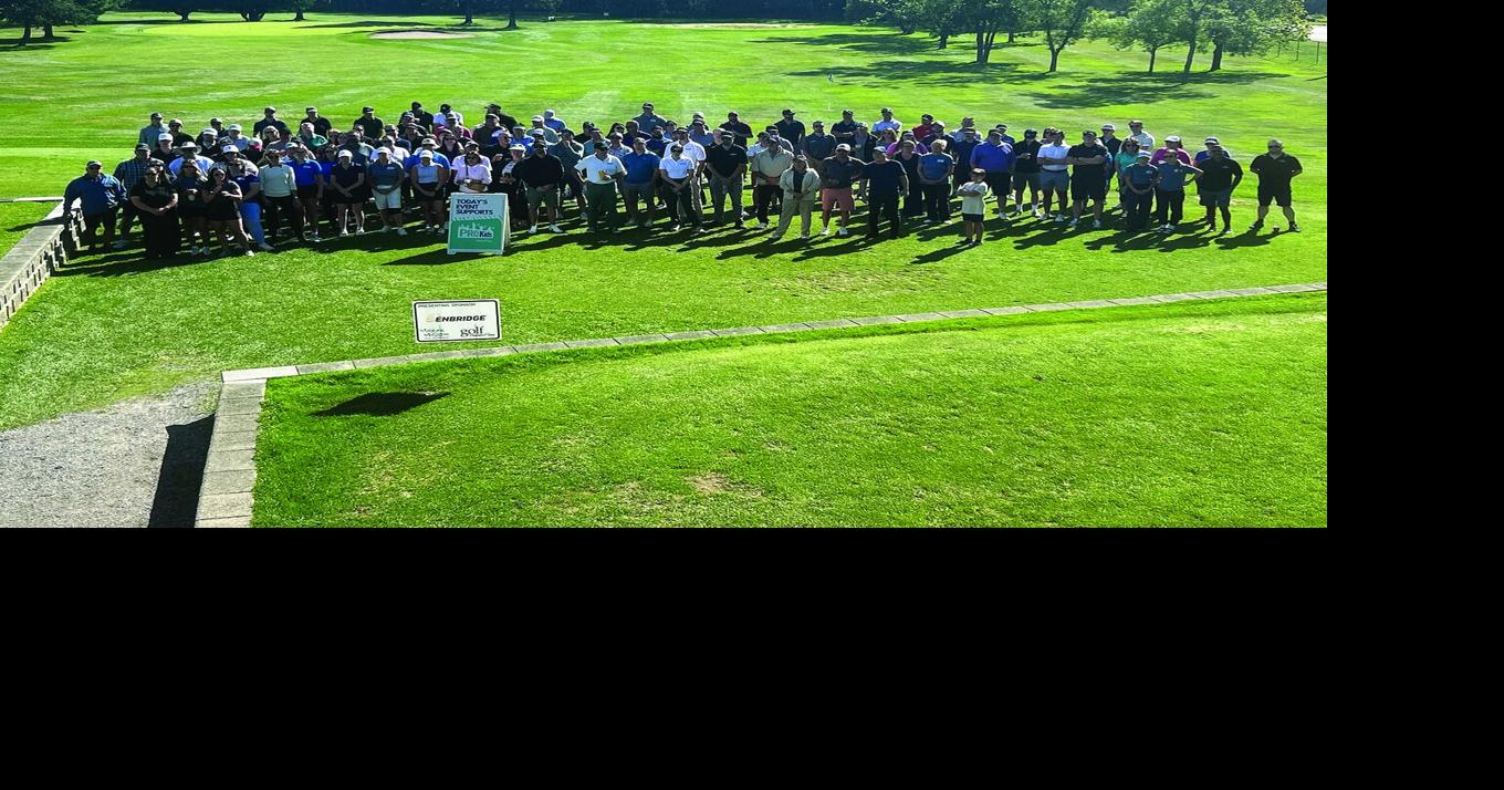 Smiles and donations on the golf links