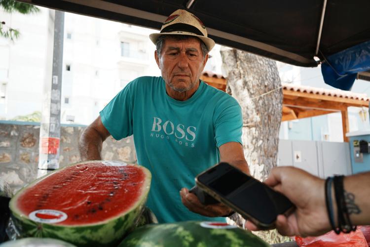 High tech tax authority helps Greece return to Europe s financial
