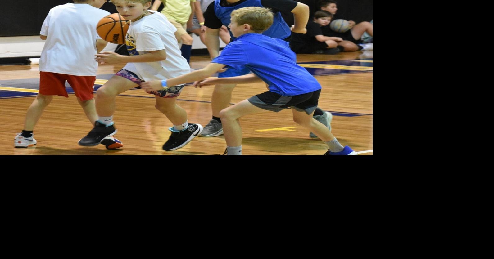 Learning the game at basketball camps