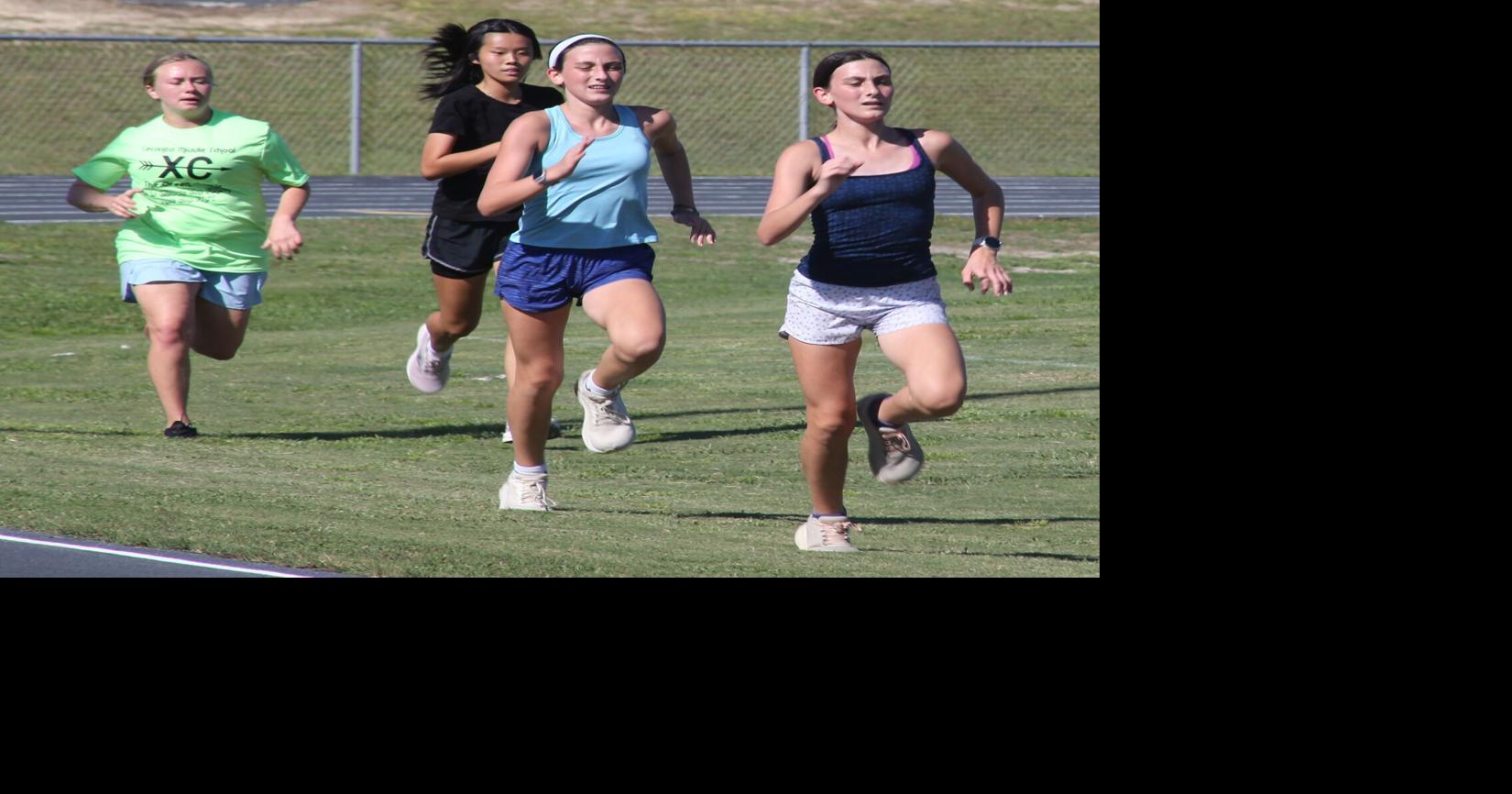 Same, opposite, still together: Mirror twins learn to run their own races