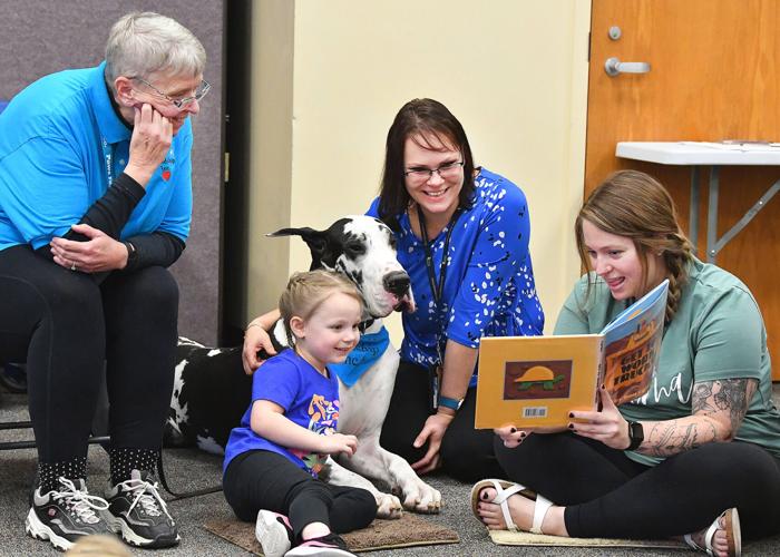 Paws for Friendship partners with local library for kids' reading to ...