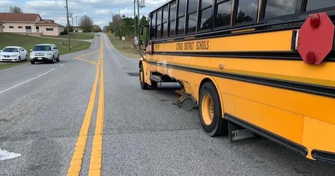 Vehicle collides with school bus returning students home; motorist ...