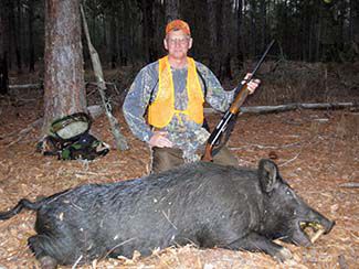 Hog Hunter With Hog