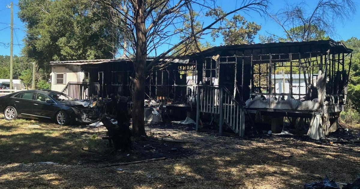 Search Rescue Mobile Firefighters rescue occupant from burning mobile home near Inverness ...