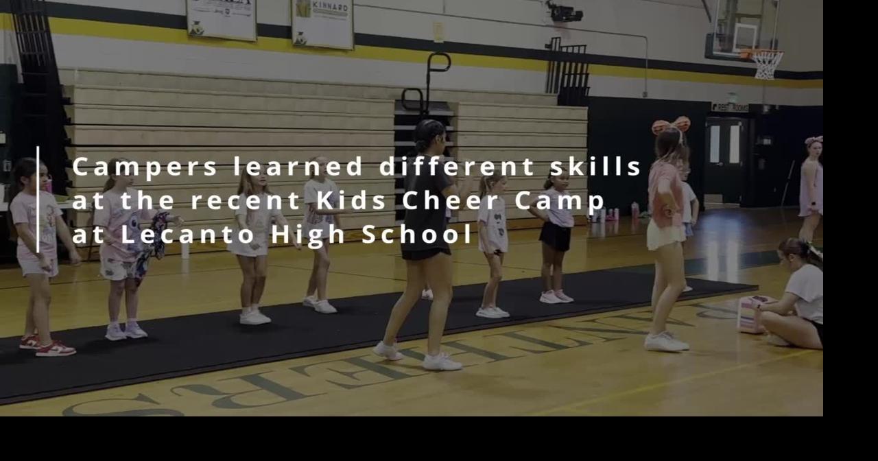 Learning cheerleading skills at LHS Kids Cheer Camp