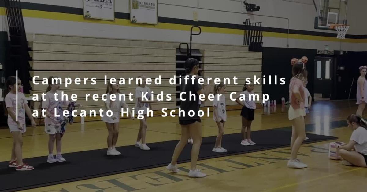 Learning cheerleading skills at LHS Kids Cheer Camp