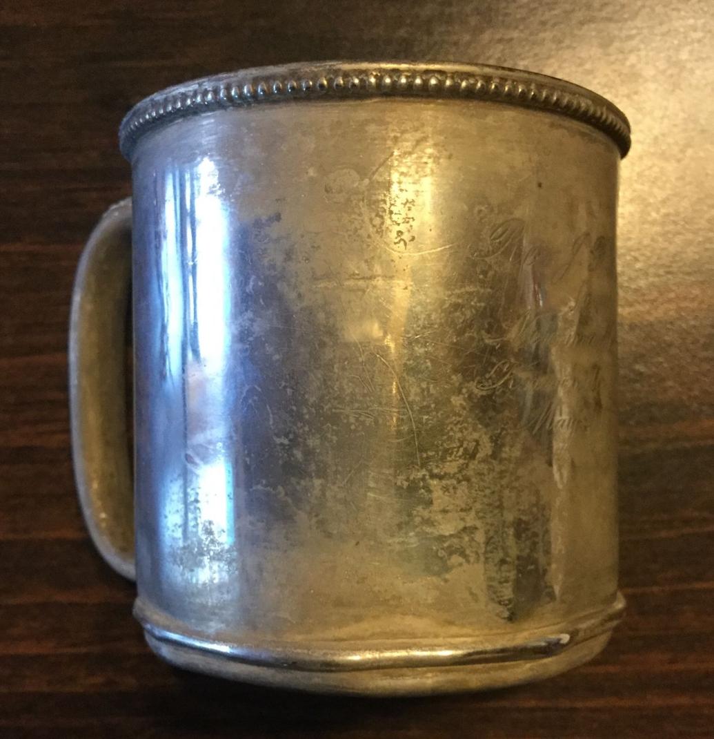 Markings show antique cup was made from sterling silver Real Estate