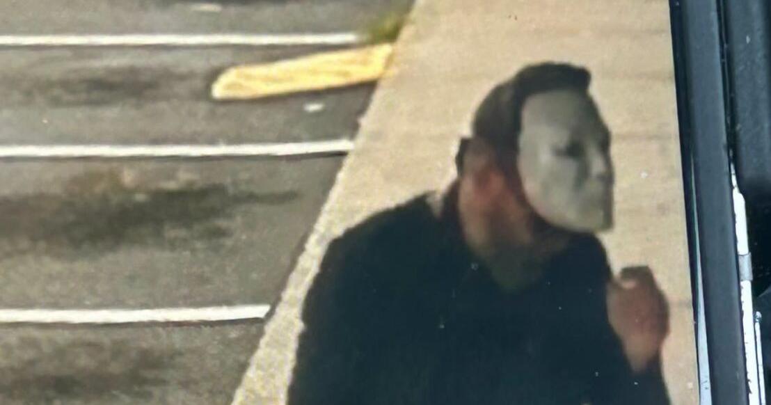Masked suspect sought after armed robbery at liquor store