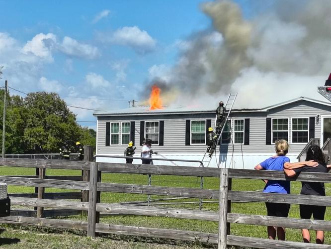Firefighters battle mobile home blaze, rescue pets | Local News ...