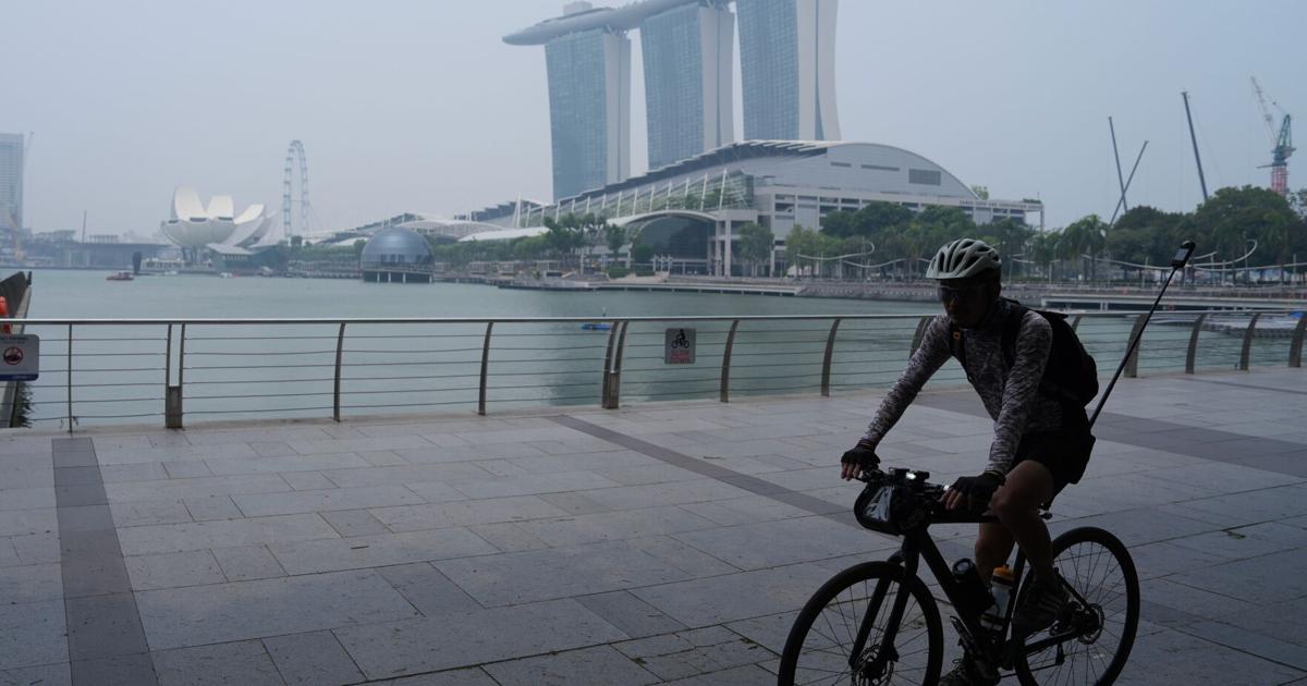 Transboundary haze from Indonesian fires shrouds Singapore's Marina Bay, pushing air quality back into unhealthy range on Monday, Sept. 14, 2026.