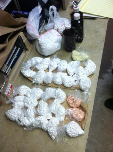 Raid on fugitive nets huge drug cache | Local News | chronicleonline.com