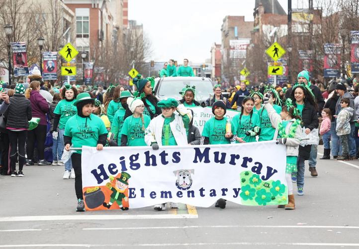 A green halfmile WilkesBarre St. Patrick's Day Parade features music